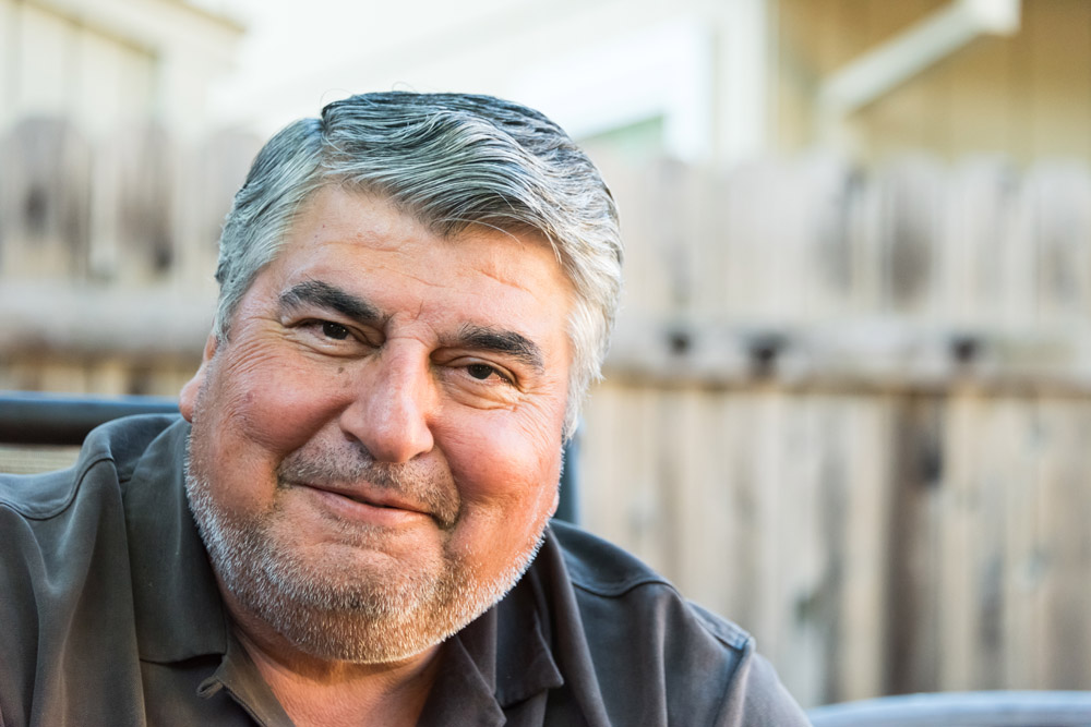 Smiling gray haired man