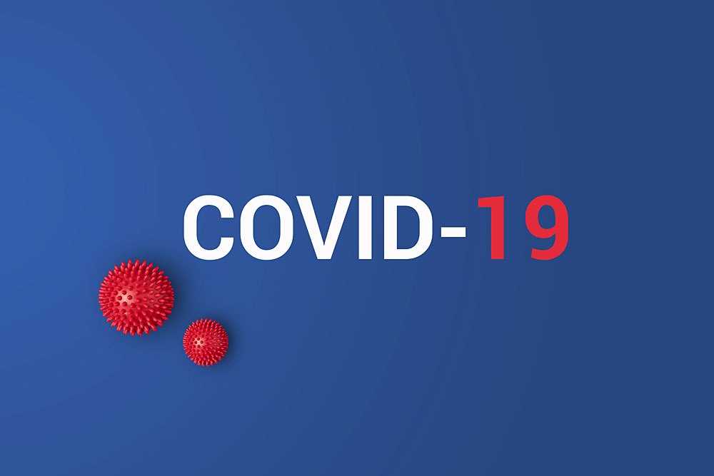 Depiction of red COVID-19 virus on blue background